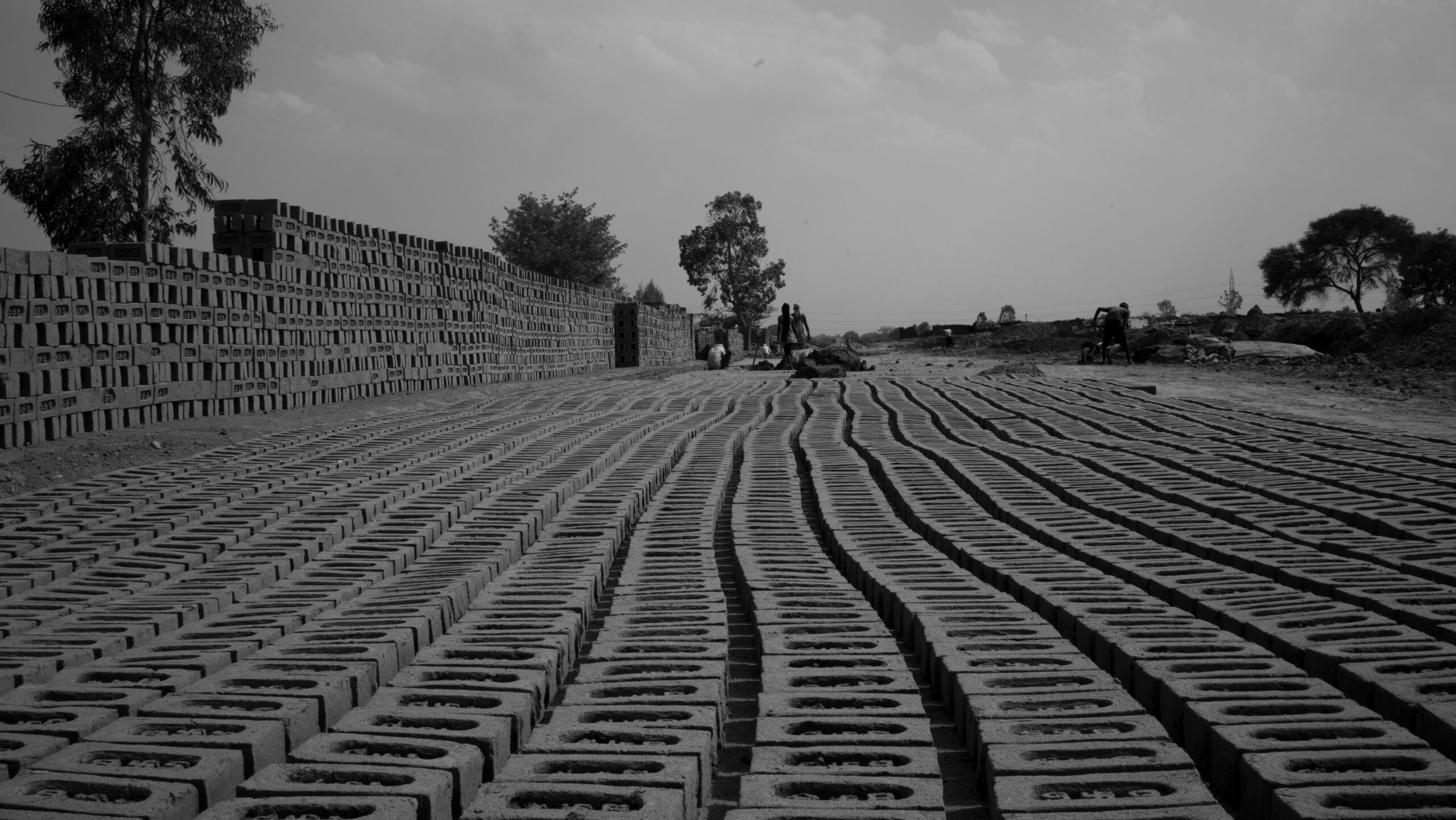 a black and white photo of a brick wall